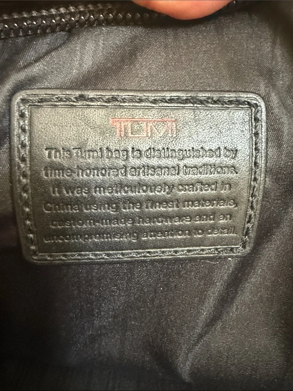 Tumi alpha leather